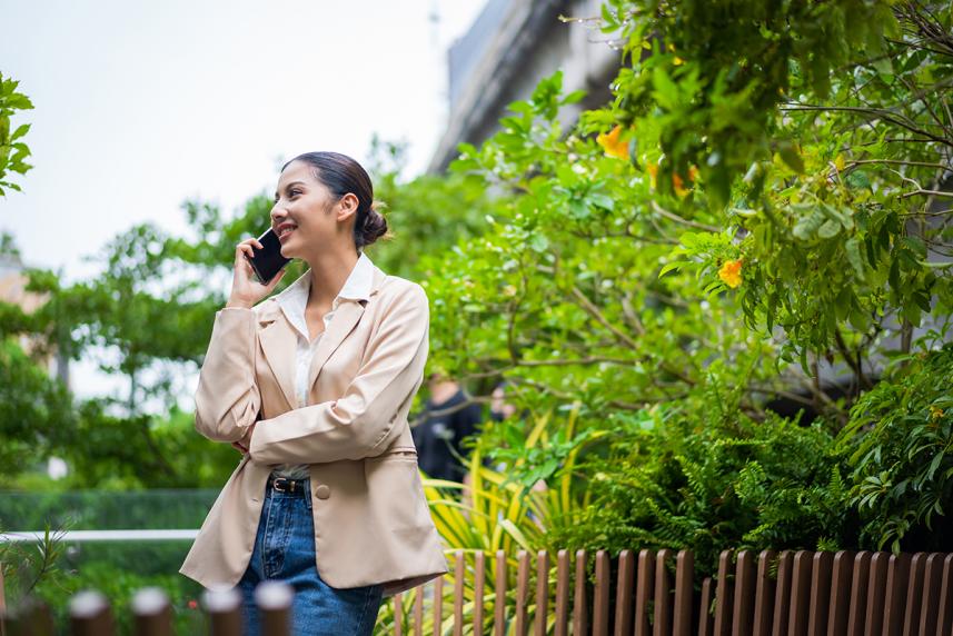 Woman on cell phone outdoors 